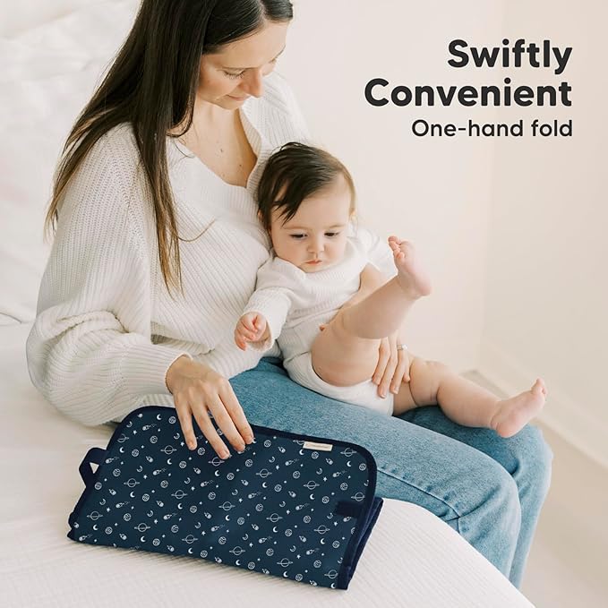 KeaBabies Portable Diaper Changing Pad, Easy Wipe Clean - Foldable Waterproof Baby Changing Mat for Diaper Bag, Compact, Lightweight, 25x13 Baby Changer Travel Essential, Machine Washable (Planets)